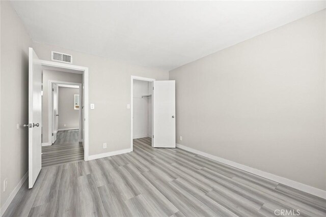 931 W Duarte Rd Unit 6, Arcadia, CA 91007 - unfurnished bedroom featuring light wood-style floors