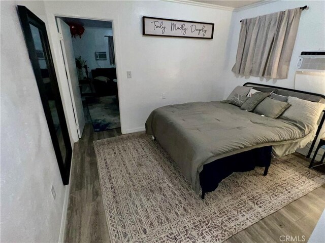 10945-10953 Campbell Ave, Riverside, CA 92505 - bedroom with wood finished floors and crown molding