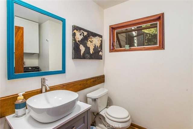 30421 Live Oak Dr, Running Springs, CA 92382 - bathroom with vanity and washer / clothes dryer