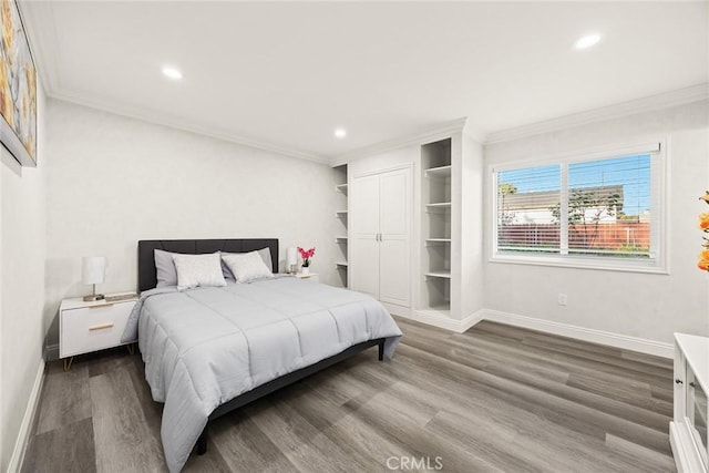 10210 Green St Unit 10210B, Temple City, CA 91780 - bedroom featuring crown molding, dark wood-style floors, recessed lighting, and a closet
