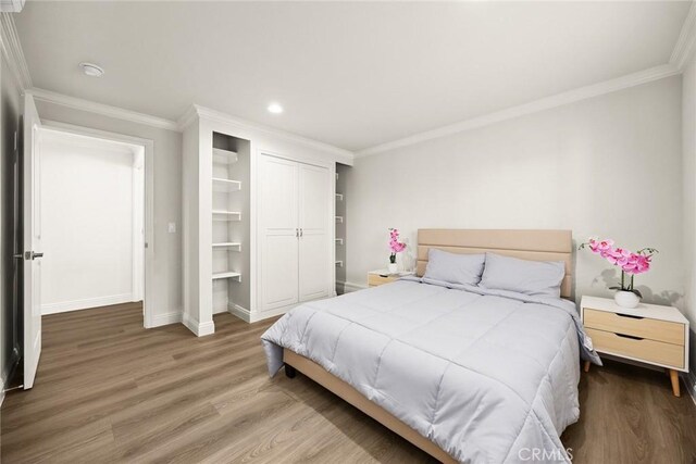 10210 Green St Unit 10210B, Temple City, CA 91780 - bedroom with wood finished floors, ornamental molding, recessed lighting, and a closet