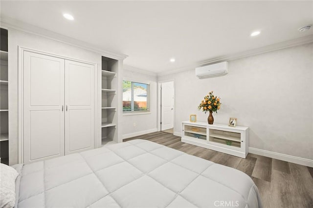 10210 Green St Unit 10210B, Temple City, CA 91780 - bedroom with an AC wall unit, crown molding, wood finished floors, recessed lighting, and a closet