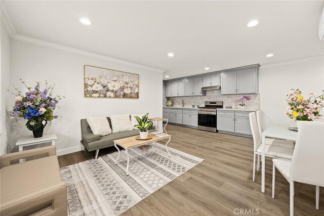 10210 Green St Unit 10210B, Temple City, CA 91780 - living area featuring ornamental molding, recessed lighting, and light wood-style flooring