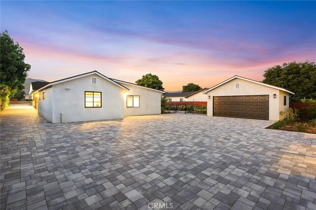 10210 Green St Unit 10210B, Temple City, CA 91780 - view of front of property featuring stucco siding, a garage, and decorative driveway