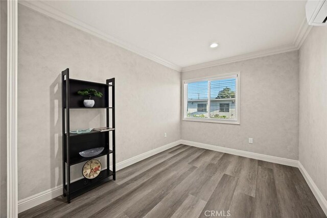 10210 Green St Unit 10210B, Temple City, CA 91780 - spare room featuring an AC wall unit, wood finished floors, crown molding, and recessed lighting