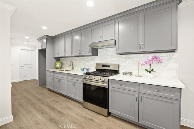 10210 Green St Unit 10210B, Temple City, CA 91780 - kitchen with stainless steel gas range, gray cabinets, under cabinet range hood, and recessed lighting
