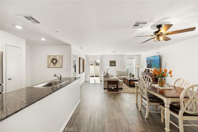 1943 Auger Pl, Hemet, CA 92545 - dining space with dark wood finished floors, a ceiling fan, and recessed lighting