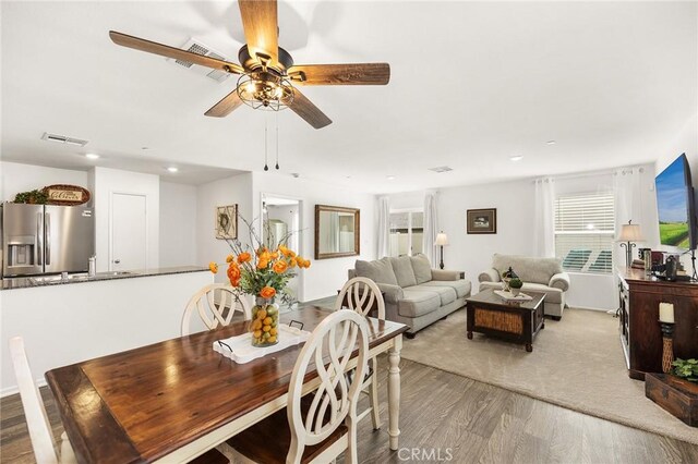 1943 Auger Pl, Hemet, CA 92545 - dining space with light wood finished floors, ceiling fan, and recessed lighting