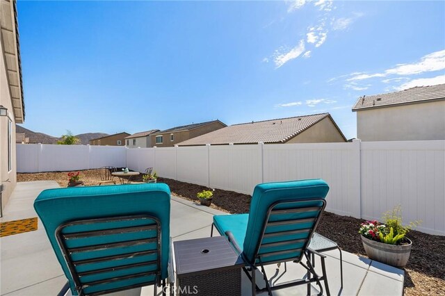 1943 Auger Pl, Hemet, CA 92545 - fenced backyard with a patio