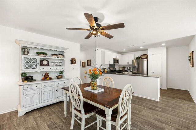 1943 Auger Pl, Hemet, CA 92545 - dining room with dark wood finished floors, a ceiling fan, and recessed lighting