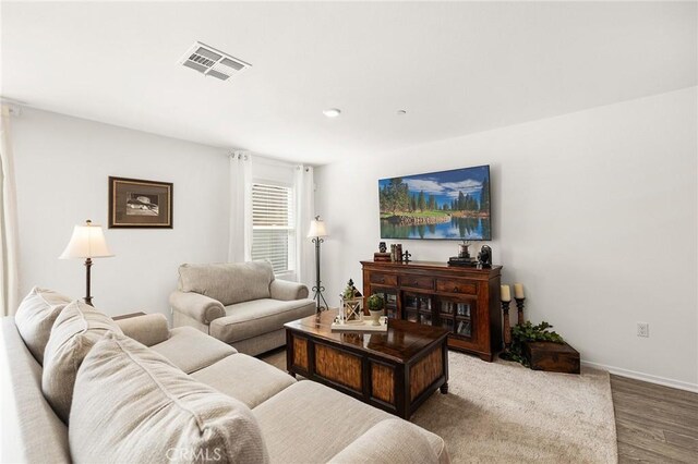 1943 Auger Pl, Hemet, CA 92545 - living room featuring wood finished floors and baseboards