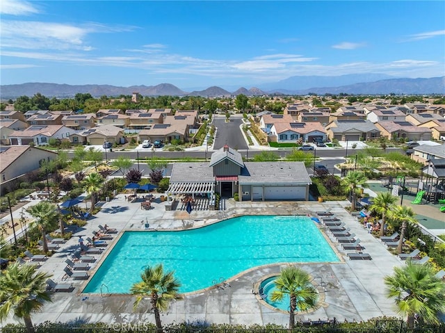 1943 Auger Pl, Hemet, CA 92545 - community pool with a residential view, a mountain view, and a patio area
