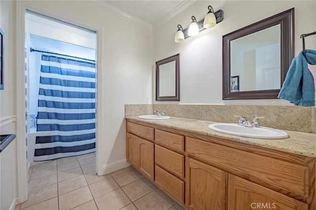 770 Warbler Ct, Merced, CA 95340 - bathroom with double vanity, tile patterned floors, crown molding, and curtained shower