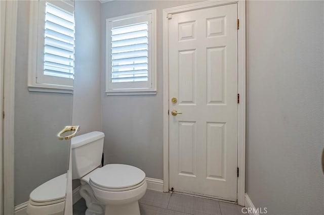 770 Warbler Ct, Merced, CA 95340 - bathroom featuring toilet and tile patterned floors