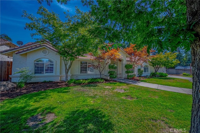 770 Warbler Ct, Merced, CA 95340 - view of front facade with stucco siding and a tiled roof