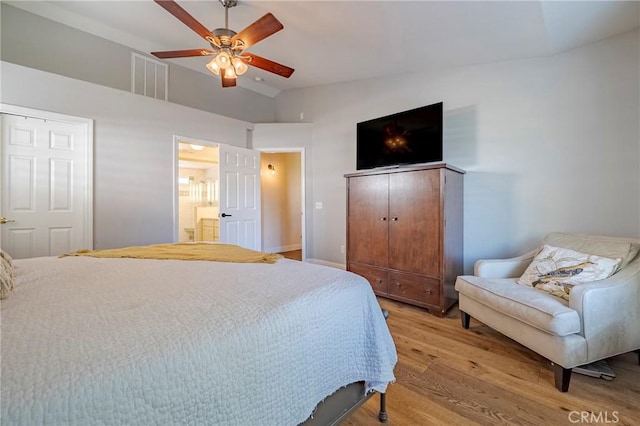 770 Warbler Ct, Merced, CA 95340 - bedroom featuring light wood-type flooring, ceiling fan, connected bathroom, and high vaulted ceiling