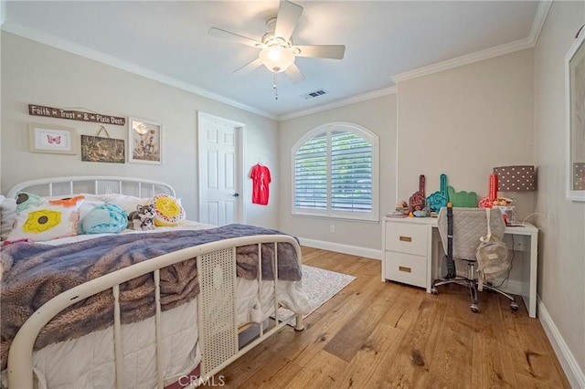 770 Warbler Ct, Merced, CA 95340 - bedroom featuring light wood-type flooring, crown molding, a desk, and ceiling fan