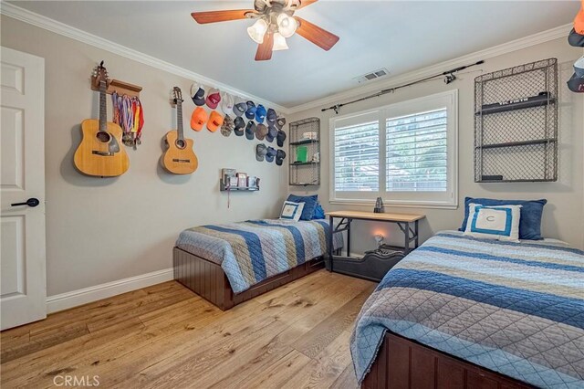 770 Warbler Ct, Merced, CA 95340 - bedroom featuring wood finished floors, ornamental molding, and ceiling fan