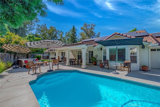 770 Warbler Ct, Merced, CA 95340 - view of pool featuring a patio area and an outdoor living space