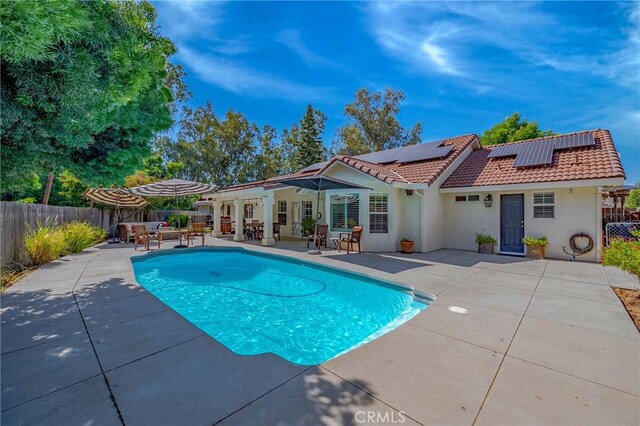 770 Warbler Ct, Merced, CA 95340 - view of swimming pool featuring a patio and a fenced backyard