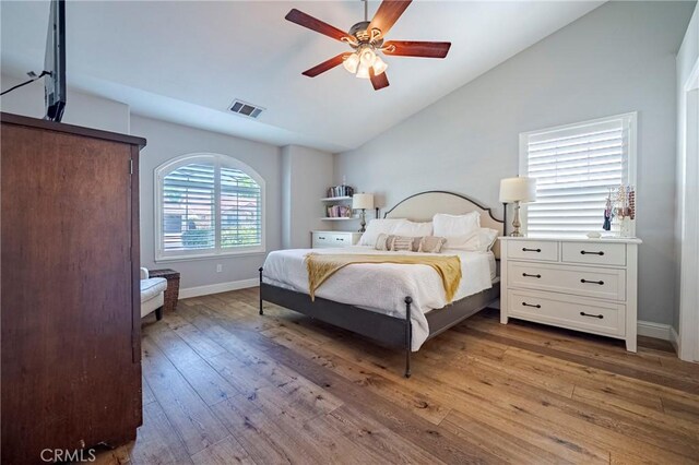 770 Warbler Ct, Merced, CA 95340 - bedroom with vaulted ceiling, wood-type flooring, and ceiling fan