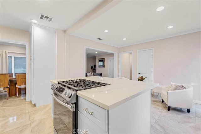 19119 Lemay St, Reseda, CA 91335 - kitchen featuring stainless steel range with gas cooktop, recessed lighting, white cabinetry, light stone counters, and ornamental molding