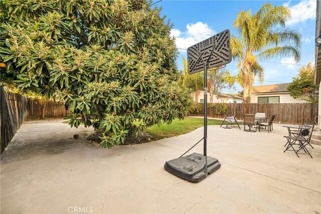 19119 Lemay St, Reseda, CA 91335 - fenced backyard with a patio and outdoor dining area