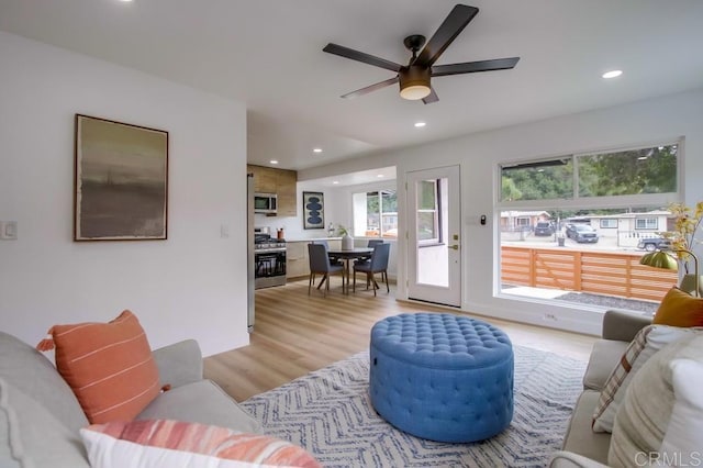 5610 Streamview Dr, San Diego, CA 92105 - living room featuring light wood-style flooring, a ceiling fan, and recessed lighting