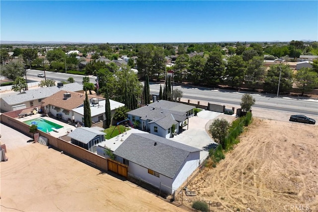 42545 30th St W, Lancaster, CA 93536 - aerial view of residential area with a pool and a tree filled landscape