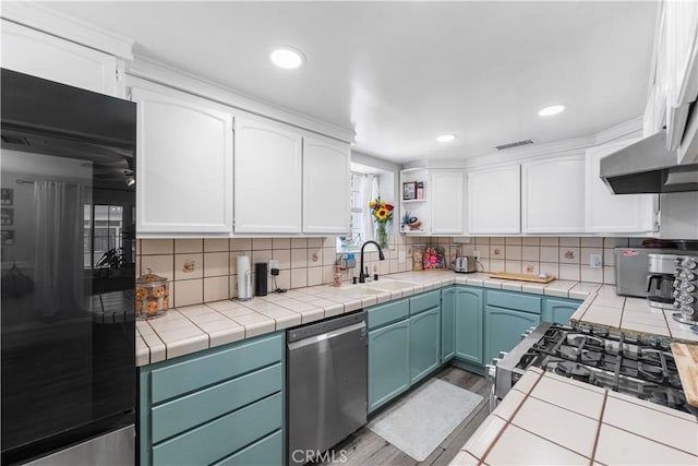 42545 30th St W, Lancaster, CA 93536 - kitchen featuring dishwasher, white cabinets, light wood-type flooring, open shelves, and recessed lighting