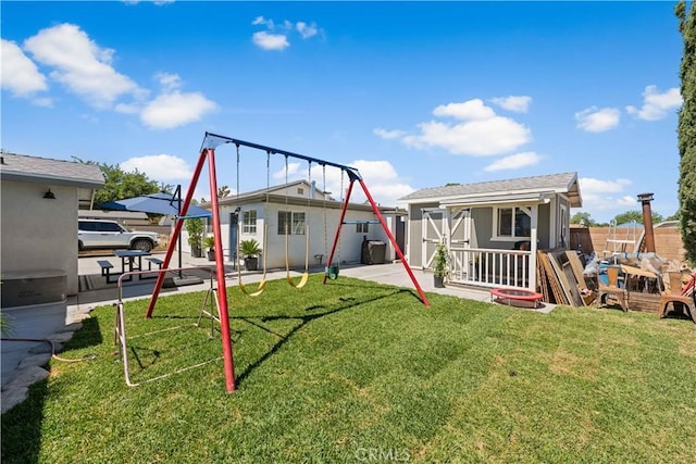 42545 30th St W, Lancaster, CA 93536 - view of playground with an outdoor structure