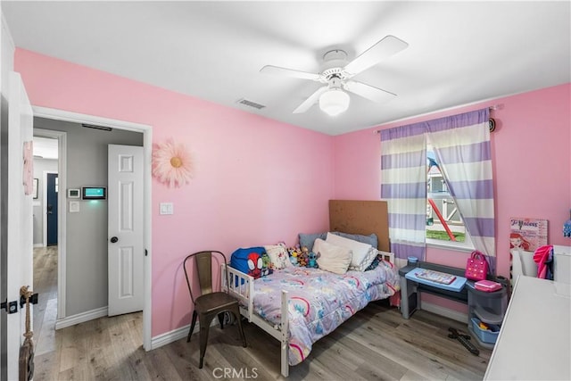 42545 30th St W, Lancaster, CA 93536 - bedroom featuring wood finished floors and a ceiling fan