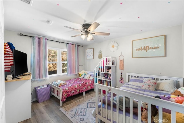42545 30th St W, Lancaster, CA 93536 - bedroom with wood finished floors and ceiling fan