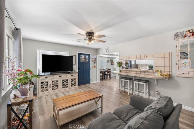 42545 30th St W, Lancaster, CA 93536 - living room with a ceiling fan and wood finished floors