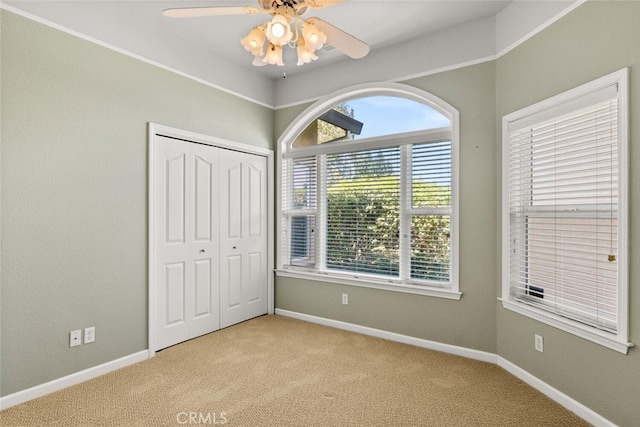 13962 Lindbergh Cir, Chico, CA 95973 - unfurnished bedroom with light colored carpet, a closet, and a ceiling fan