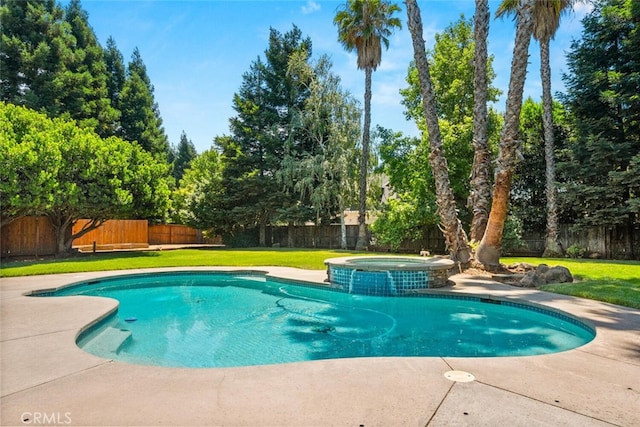 13962 Lindbergh Cir, Chico, CA 95973 - view of pool with a fenced backyard, a pool with connected hot tub, and view of scattered trees