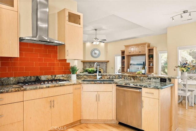 13962 Lindbergh Cir, Chico, CA 95973 - kitchen with wall chimney exhaust hood, light brown cabinetry, stainless steel appliances, a peninsula, and light wood-style flooring