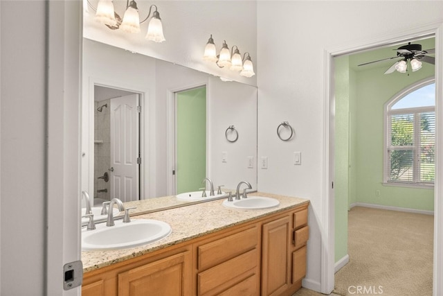 13962 Lindbergh Cir, Chico, CA 95973 - bathroom featuring double vanity, ceiling fan, and a shower