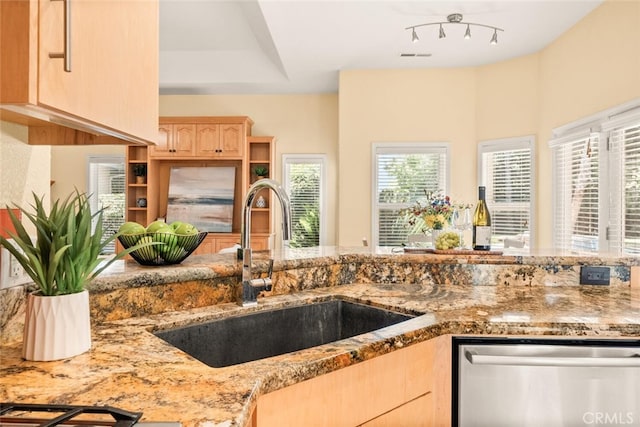 13962 Lindbergh Cir, Chico, CA 95973 - kitchen featuring dishwasher, light brown cabinetry, and light stone counters