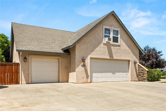 13962 Lindbergh Cir, Chico, CA 95973 - view of front of property with stucco siding, concrete driveway, a shingled roof, and cooling unit