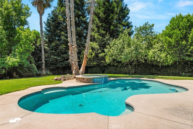 13962 Lindbergh Cir, Chico, CA 95973 - view of swimming pool with a lawn, a pool with connected hot tub, and a patio area