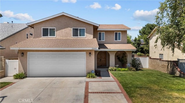 21643 Masterson Ct, Saugus, CA 91350 - traditional-style house with driveway, stucco siding, a garage, and a shingled roof