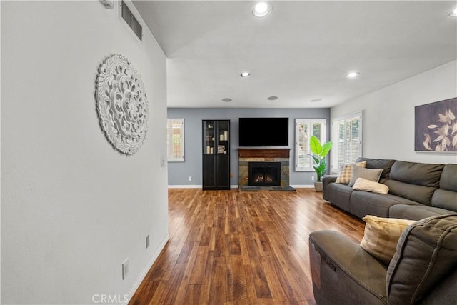 21643 Masterson Ct, Saugus, CA 91350 - living area with wood finished floors, recessed lighting, and a fireplace