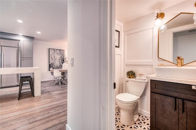 2008 Baja, Newport Beach, CA 92660 - bathroom featuring vanity, recessed lighting, and wood finished floors