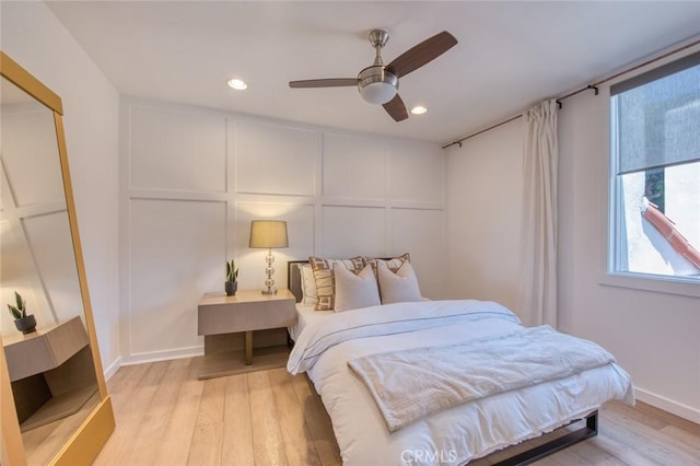 2008 Baja, Newport Beach, CA 92660 - bedroom featuring a decorative wall, light wood-type flooring, recessed lighting, and ceiling fan