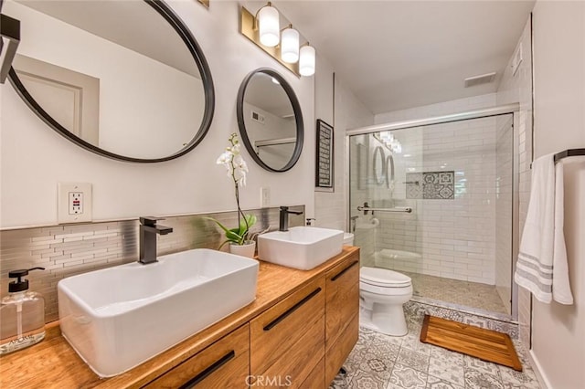 2008 Baja, Newport Beach, CA 92660 - full bathroom with a tile shower, double vanity, and tile patterned flooring