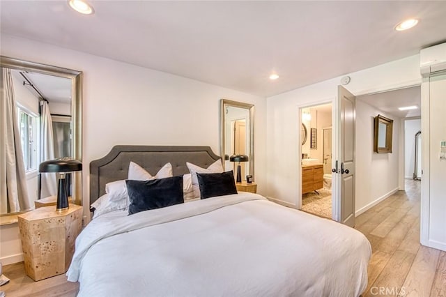 2008 Baja, Newport Beach, CA 92660 - bedroom with light wood-style floors, recessed lighting, and ensuite bathroom