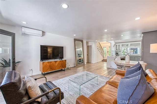 2008 Baja, Newport Beach, CA 92660 - living room featuring a wall mounted AC, stairway, recessed lighting, and light wood finished floors