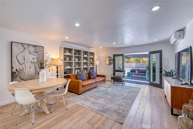 2008 Baja, Newport Beach, CA 92660 - living room featuring a wall mounted air conditioner, light wood-style flooring, and recessed lighting