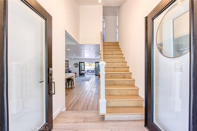 2008 Baja, Newport Beach, CA 92660 - stairway featuring hardwood / wood-style flooring and baseboards